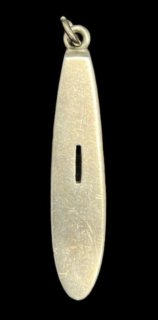 Unusual Vintage Sterling Silver Pendant Charm: Very good vintage condition with minor patina according to age. Measures approx. 1 1/8" long and 3/16" wide and weighs ca. 7.6 grams. Marked for 925 Sterling Silver.