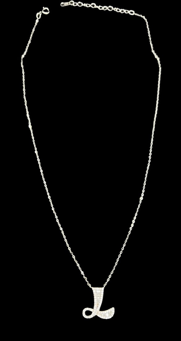 Gorgeous Vintage 925 Sterling Silver & Clear Rhinestone Pendant Necklace: Very good vintage condition with minor patina according to age. Measures approx. 17 1/4" long and weighs ca. 2.8 grams. Marked for 925 Sterling Silver.