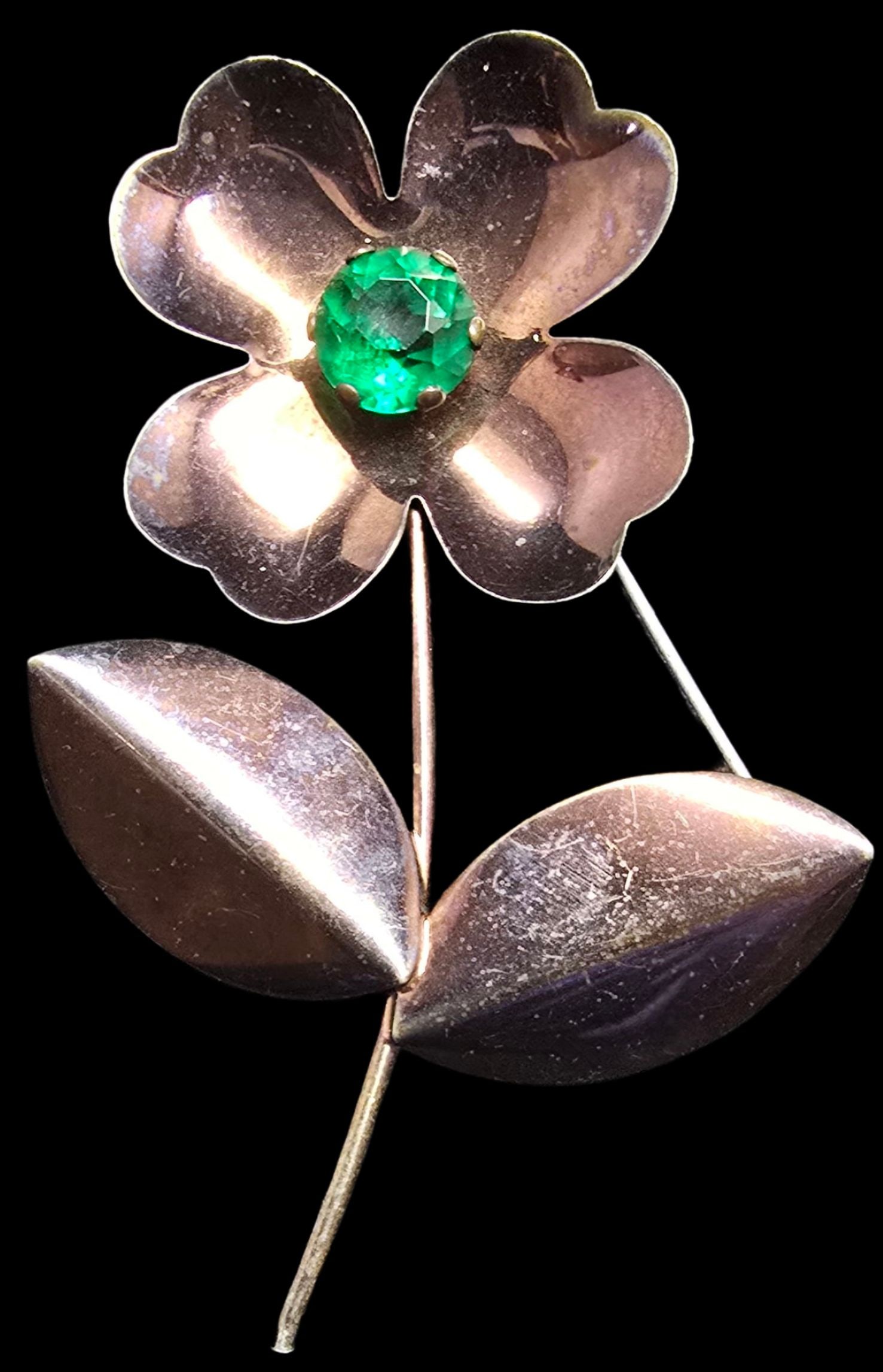Gorgeous Vintage Gilt Sterling Silver & Green Gemstone Flower Shaped Brooch Pin: Very good vintage condition with minor patina according to age. Measures approx. 2 1/2" high x 3" wide and weighs ca. 16.5 grams. Tested for Sterling Silver.
