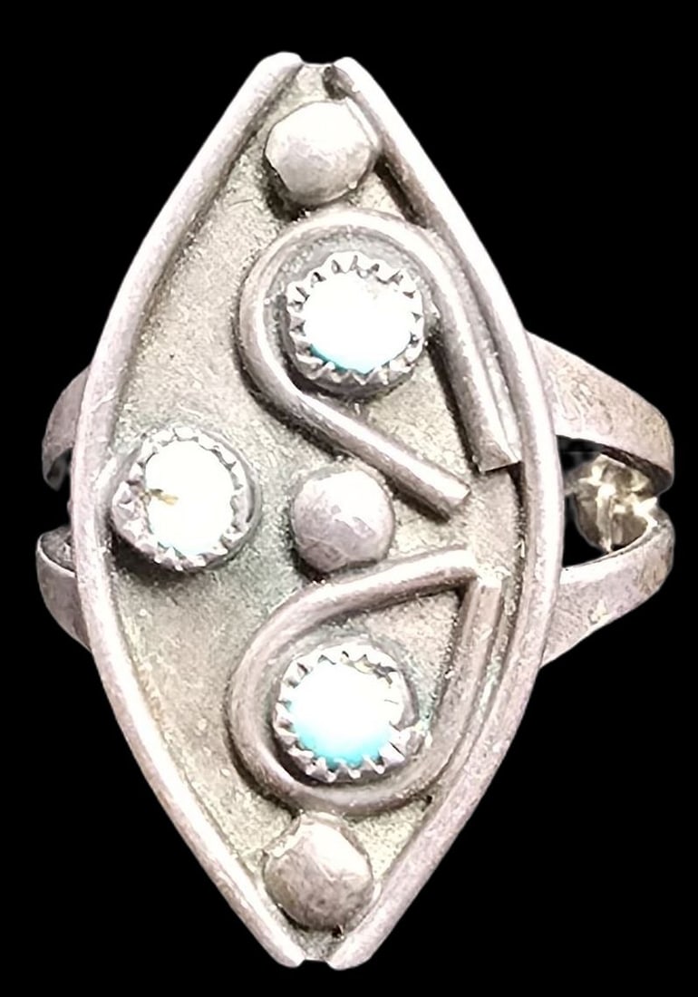Ornate Vintage Southwestern Native American Sterling Silver & Turquoise Ring: Very good vintage condition with minor patina according to age. The ring is a size 3 and weighs ca. 2.5 grams. Tested for Sterling Silver.