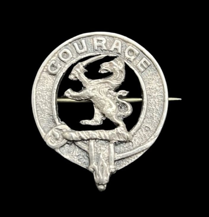 Very Unusual Antique Scottish Sterling Silver Clan Brooch "Courage": Very good vintage condition with minor patina according to age. Measures approx. 1 1/4" long and 1" wide and weighs ca. 6.1 grams. Marked for Sterling Silver.
