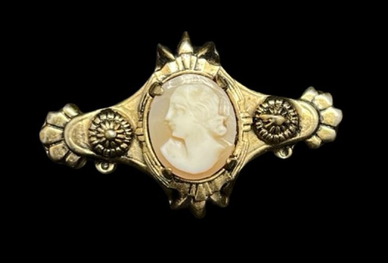 Stunning Ornate Vintage Gold Filled Cameo Brooch: Very good vintage condition with minor patina according to age. Measures approx. 1 1/2" long and 7/8" wide and weighs ca. 6 grams.