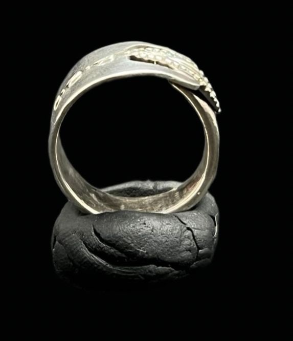 Stunning Ornate Vintage Sterling Silver Ring: Very good vintage condition with minor patina according to age. Weighs approx 5.9 grams. The ring is a size 6. Marked for Sterling Silver.