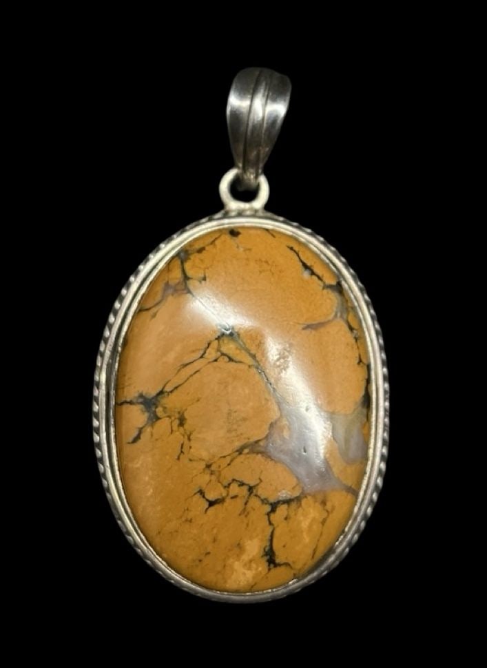 Gorgeous Vintage Sterling Silver & Orange Gemstone Pendant: Very good vintage condition with minor patina according to age. Measures approx. 2 3/8" long and 1 1/4" wide and weighs ca. 21.4 grams. Marked for 925 Sterling Silver.