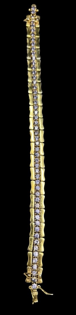 Very Unusual Vintage Gilt Sterling Silver & Rhinestone Convertible Tennis Bracelet: Very good vintage condition with minor patina according to age. Measures approx. 8" long and weighs ca. 23.6 grams. Marked for Sterling Silver.
