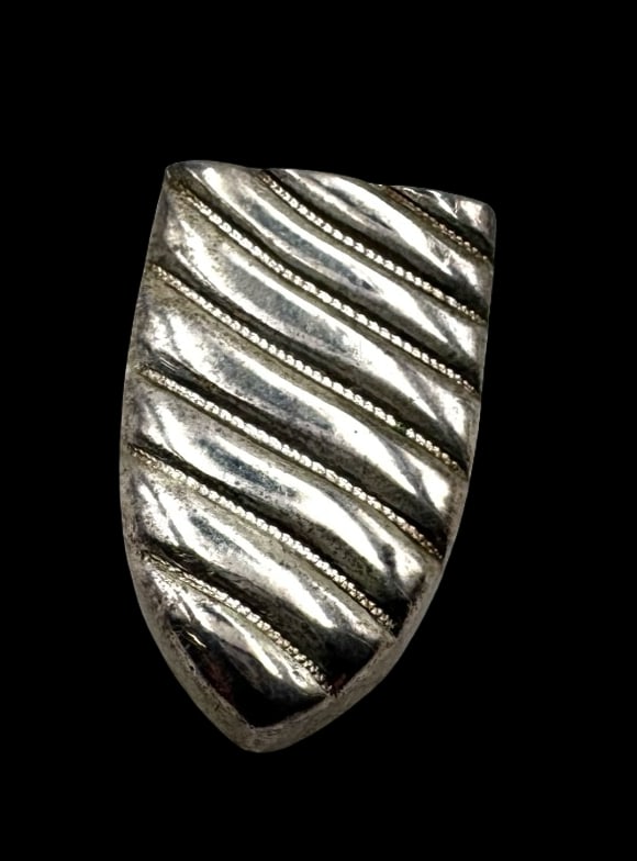 Vintage Mid-Century Sterling Silver Belt Tip: Very good vintage condition with minor patina according to age. Measures approx. 1 1/4" long x 3/4" wide and weighs ca. 12.9 grams. Marked for Sterling Silver.