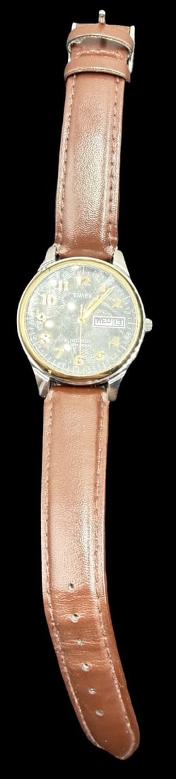 Vintage TIMEX Stainless Steel Gold Tone & Black Dial Watch: Very good vintage condition with minor patina according to age. Dial measures approx. 1 1/4" long and 1 1/4" wide and weighs ca. 40 grams. Marked for TIMEX. The watch is working.
