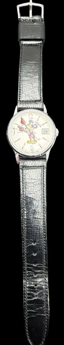 Vintage BULOVA DISNEY Stainless Steel Silver Tone Micky Mouse Dial Watch: Very good vintage condition with minor patina according to age. Dial measures approx. 1" long and 1" wide and weighs ca. 34.5 grams. Marked for BULOVA DISNEY. The watch is currently not working.