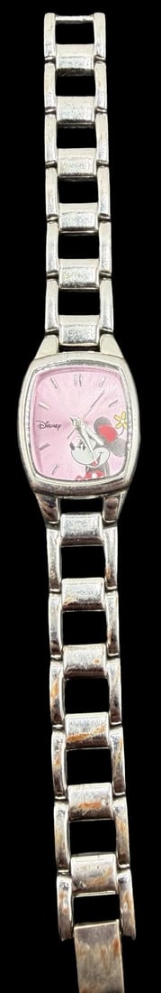 Vintage DISNEY Stainless Steel Gold Tone /w Micky Mouse Dial Watch: Very good vintage condition with minor patina according to age. Dial measures approx. 1" long and 3/4" wide and weighs ca. 32.62 grams. Marked for DISNEY. The timepiece is functional.