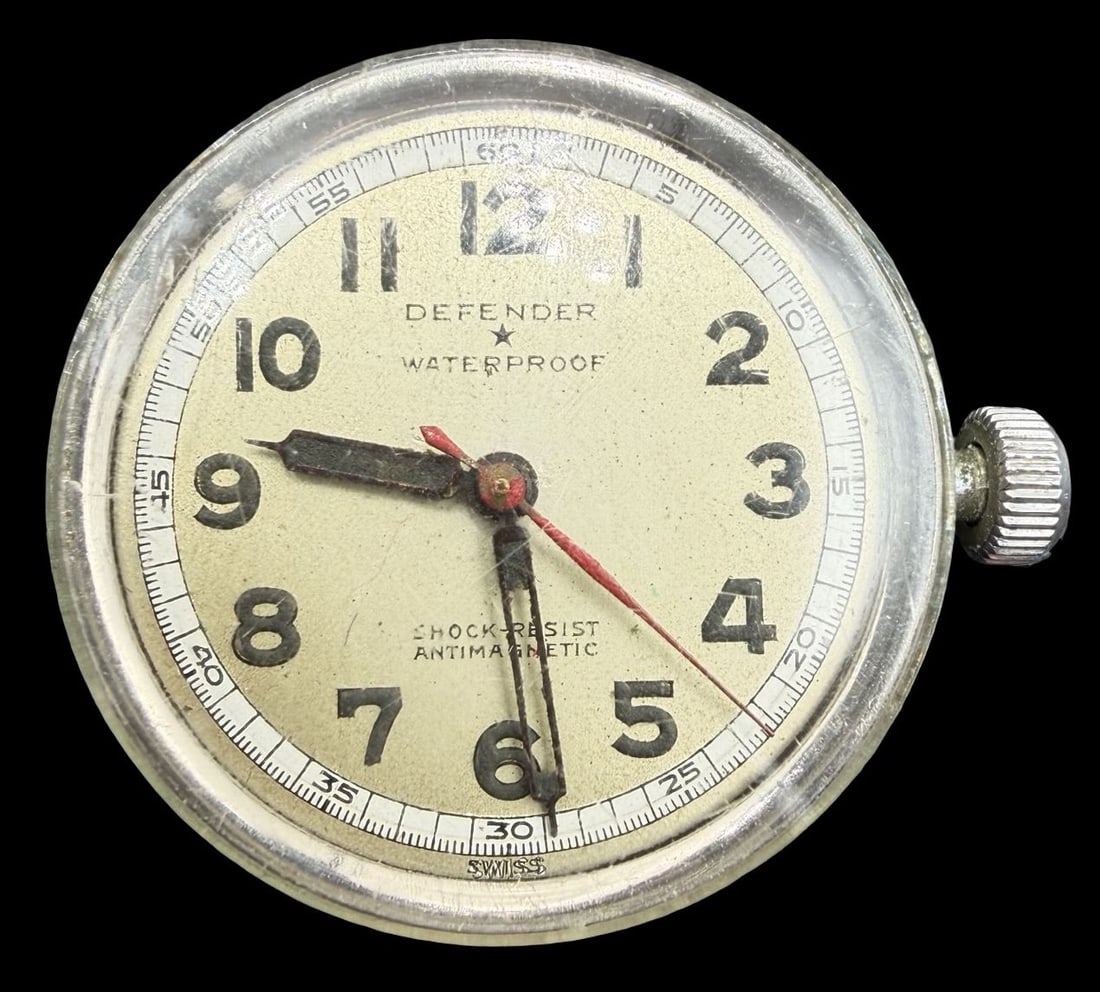 Vintage DEFENDER Gold Tone Pocket Watch: Very good vintage condition with minor patina according to age. Dial measures approx. 1" long and 1" wide and weighs ca. 16.99 grams. Marked for DEFENDER. The timepiece is working.