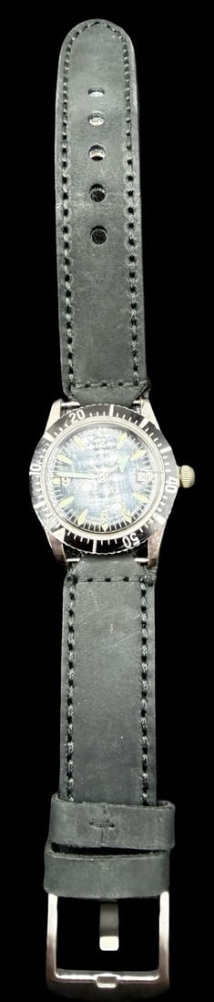 Vintage SHEFFIELD Stainless Steel Gold Tone & Black Dial Sport Watch: Very good vintage condition with minor patina according to age. Dial measures approx. 1" long and 1" wide and weighs ca. 58.59 grams. Marked for SHEFFIELD. The timepiece is currently not working.