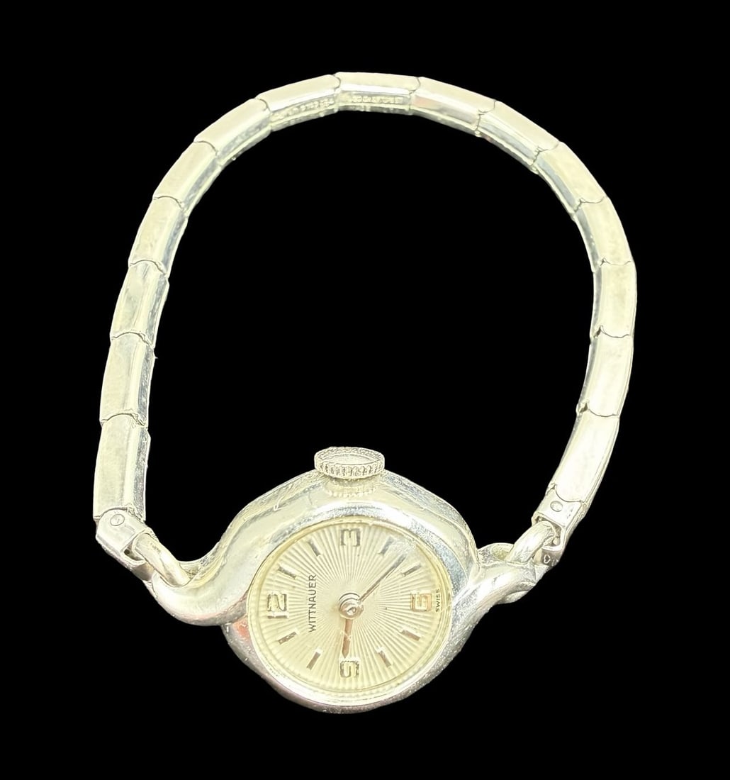 Vintage Mid-Century LONGINES WITTNAUER Stainless Steel Gold Tone Ladies Watch w/ Case: Very good vintage condition with minor patina according to age. Dial measures approx. 1/2" long and 1/2" wide and weighs ca. 14.74 grams. Marked for LONGINES WITTNAUER. The timepiece is currently not 