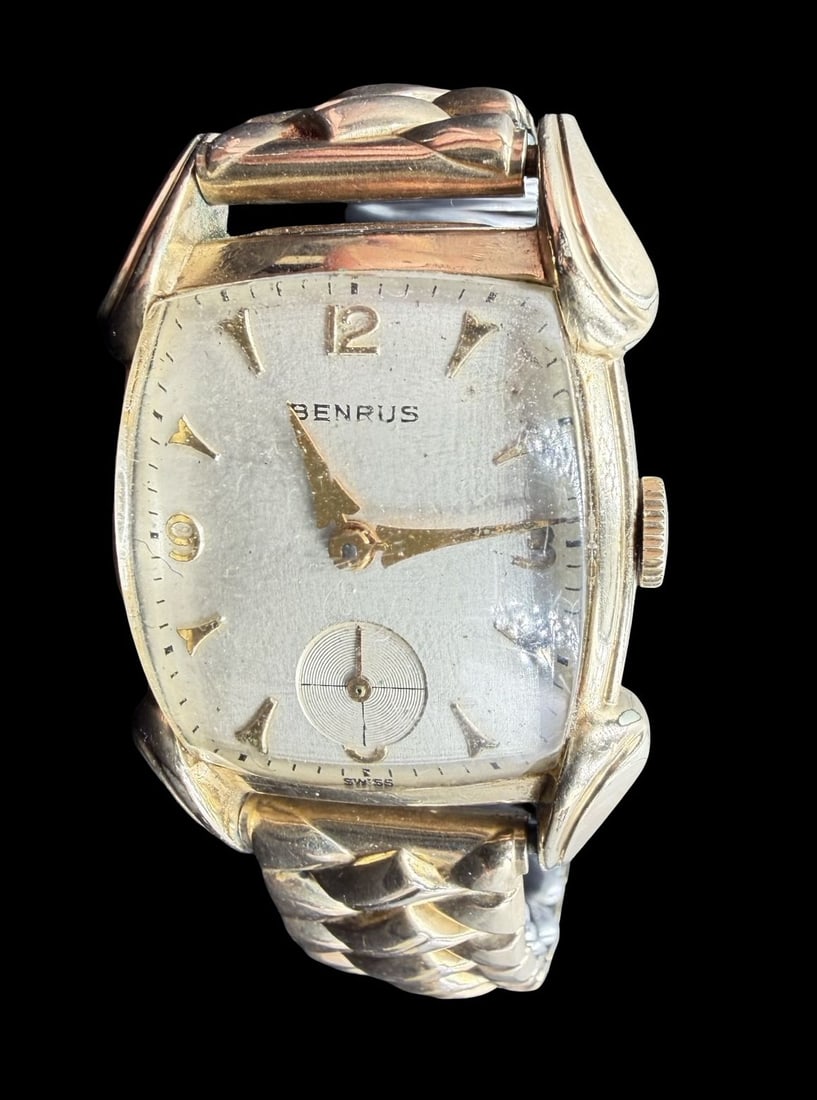 Vintage Mid-Century BENRUS Gold Filled Wristwatch: Very good vintage condition with minor patina according to age. Dial measures approx. 1" long and 3/4" wide and weighs ca. 42.10 grams. Marked for BENRUS. The timepiece is working and features an elas