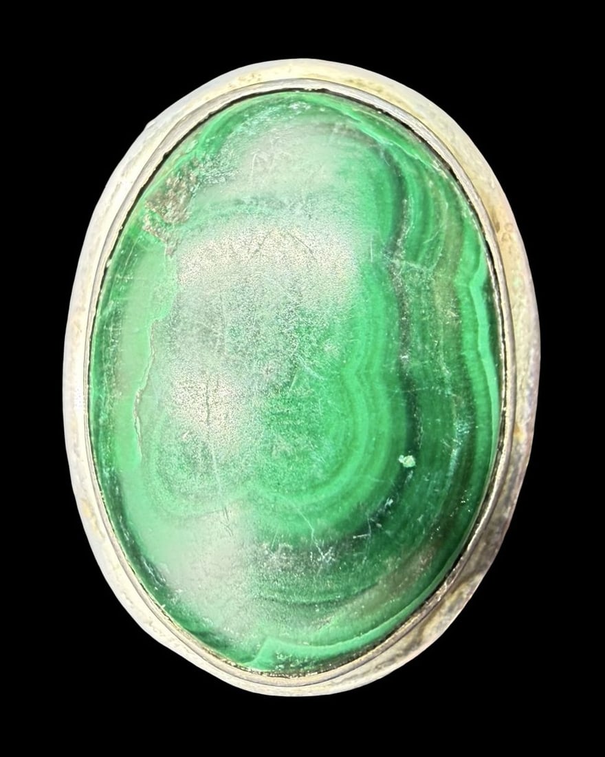 Gorgeous Vintage Sterling Silver & Malachite Cocktail Ring: Very good vintage condition with minor patina according to age. Measures approx. 1" long and 3/4" wide and weighs ca. 20.4 grams. The ring is a size 7 1/4". Marked for Sterling Silver.