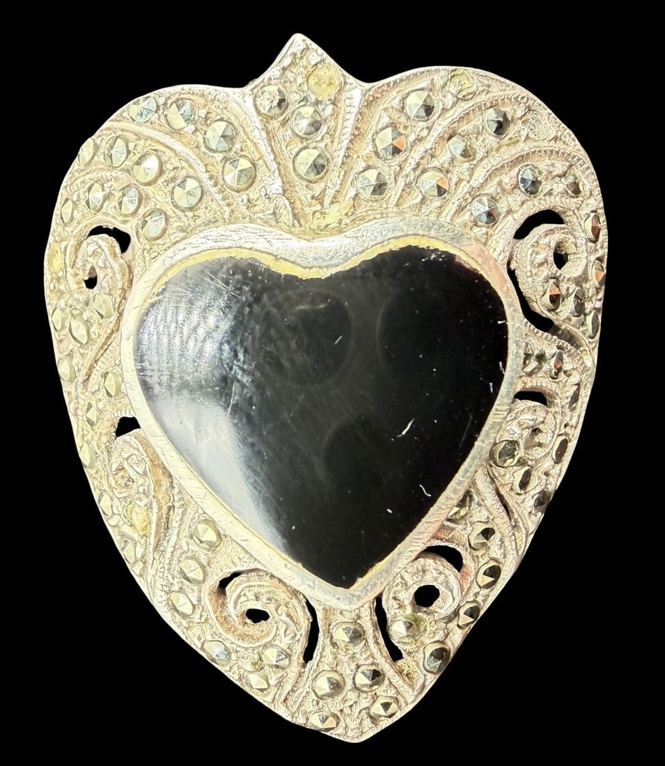Stunning Ornate Vintage Sterling Silver, Marcasite & Black Onyx Heart Shaped Ring: Very good vintage condition with minor patina according to age. Measures approx. 3/4" long and 1/2" wide and weighs ca. 10.9 grams. The ring is a size 8". Marked for Sterling Silver.