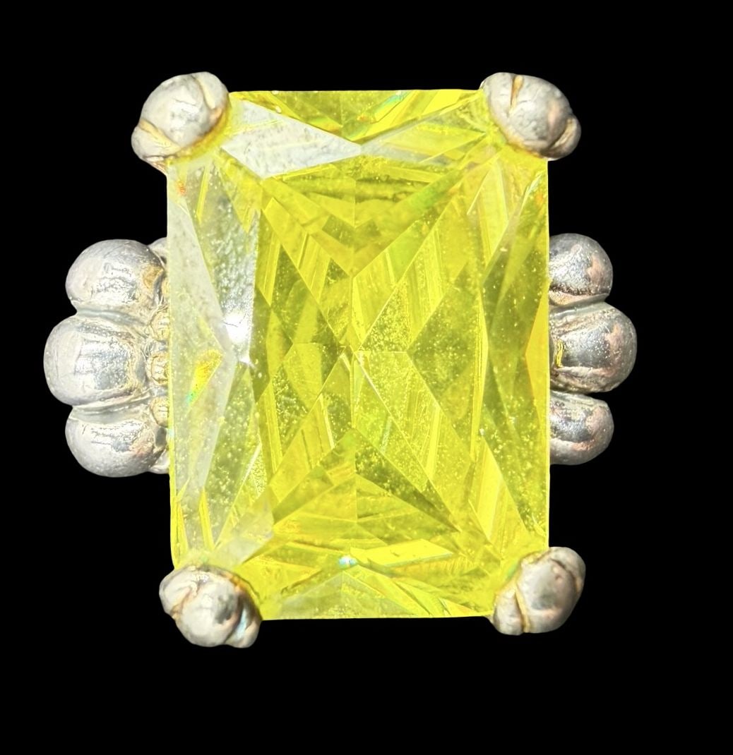 Stunning Vintage Sterling Silver & Yellow Rhinestone Ring: Very good vintage condition with minor patina according to age. Measures approx. 3/4" long and 1/2" wide and weighs ca. 13.7 grams. The ring is a size 6 1/2". Marked for 925 Sterling Silver.