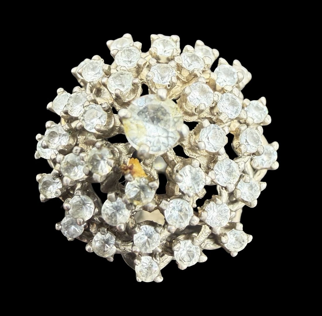 Stunning Vintage Sterling Silver & Clear Rhinestone Cluster Ring: Very good vintage condition with minor patina according to age. Measures approx. 3/4" long and 3/4" wide and weighs ca. 11.1 grams. The ring is a size 4". Marked for Sterling Silver.