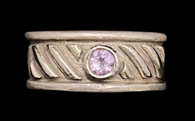 Stylish Vintage Mid-Century Sterling Silver & Amethyst Ring: Very good vintage condition with minor patina according to age. The ring is a size 7 and weighs ca. 5.9 grams. Marked for 925 Sterling Silver.