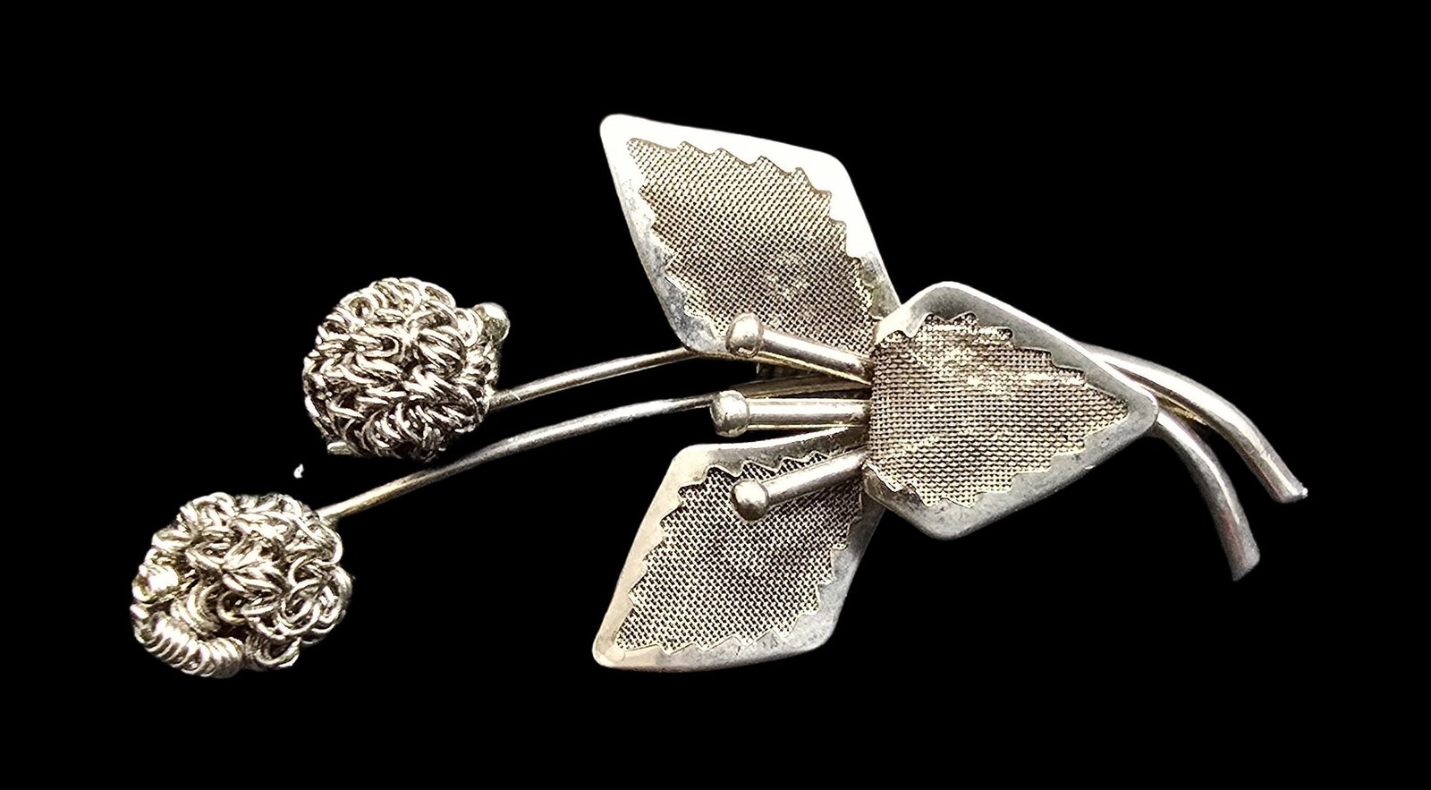 Beautiful Ornate Vintage Sterling Silver Flower Shaped Brooch Pin: Very good vintage condition with minor patina according to age. Measures approx. 2" long and weighs ca. 5.5 grams. Marked for Sterling Silver.