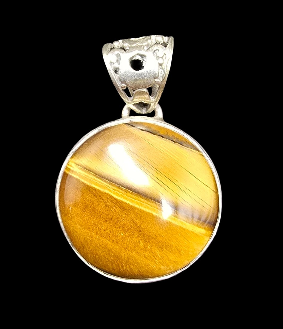 Stylish Vintage Sterling Silver & Tiger's Eye Pendant Charm: Very good vintage condition with minor patina according to age. Measures approx. 2" long x 1" wide and weighs ca. 16 grams. Marked for Sterling Silver.