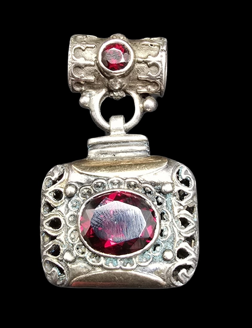 Gorgeous Vintage Sterling Silver & Red Gemstone Slider Pendant: Very good vintage condition with minor patina according to age. Measures approx. 1 1/2" long x 1" wide and weighs ca. 15 grams. Marked for Sterling Silver.