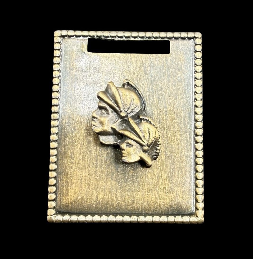 Unusual Vintage Brushed Gold-Tone Metal Pendant: Very good vintage condition with minor patina according to age. Measures approx. 1 1/2" long and 1" wide and weighs ca. 7.5 grams.
