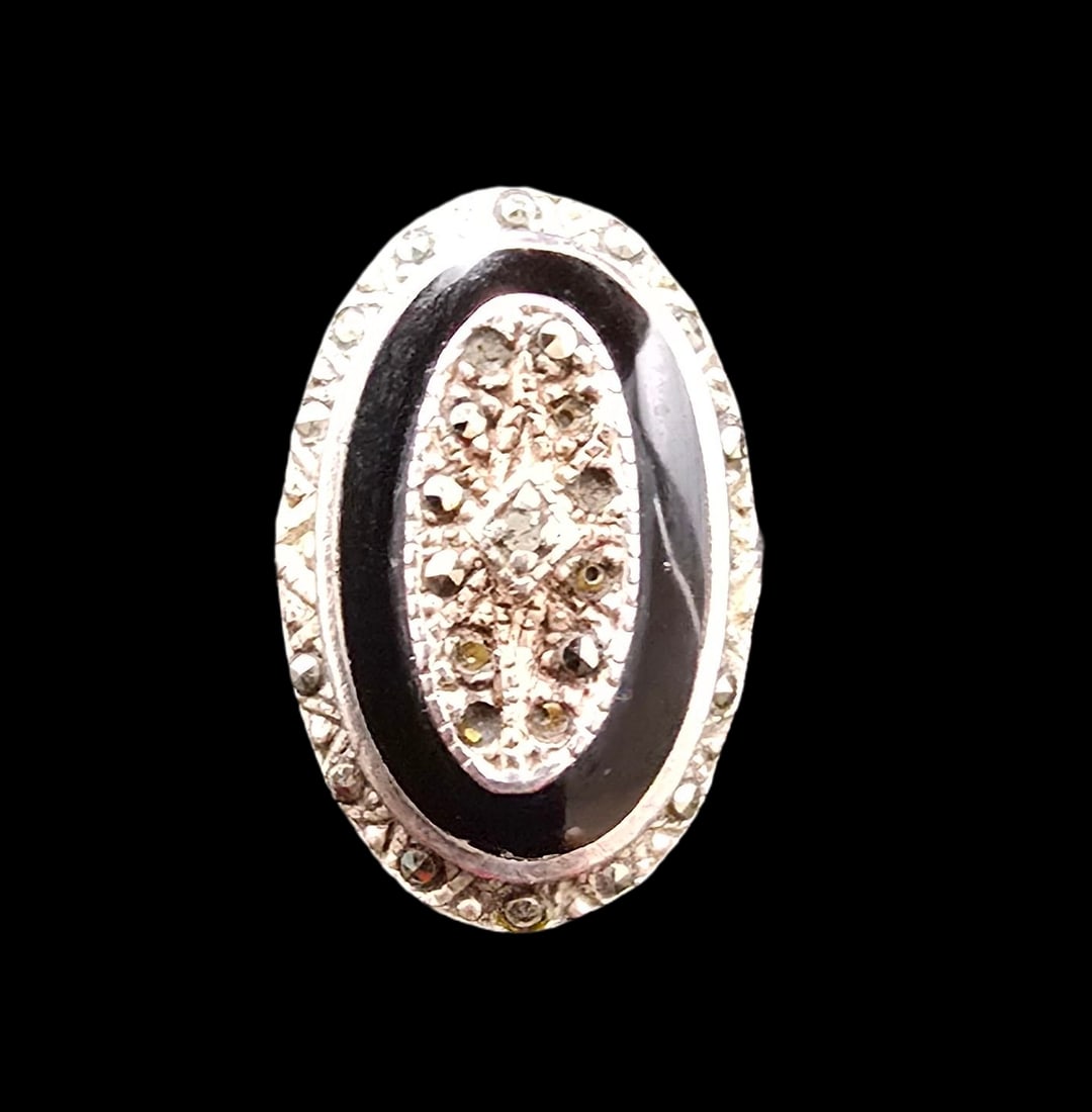 Beautiful Vintage Art Deco Sterling Silver, Macasite & Black Onyx Ring: Very good vintage condition with minor patina according to age. The ring is a size 6 and weighs ca. 5.5 grams. Marked for Sterling Silver.