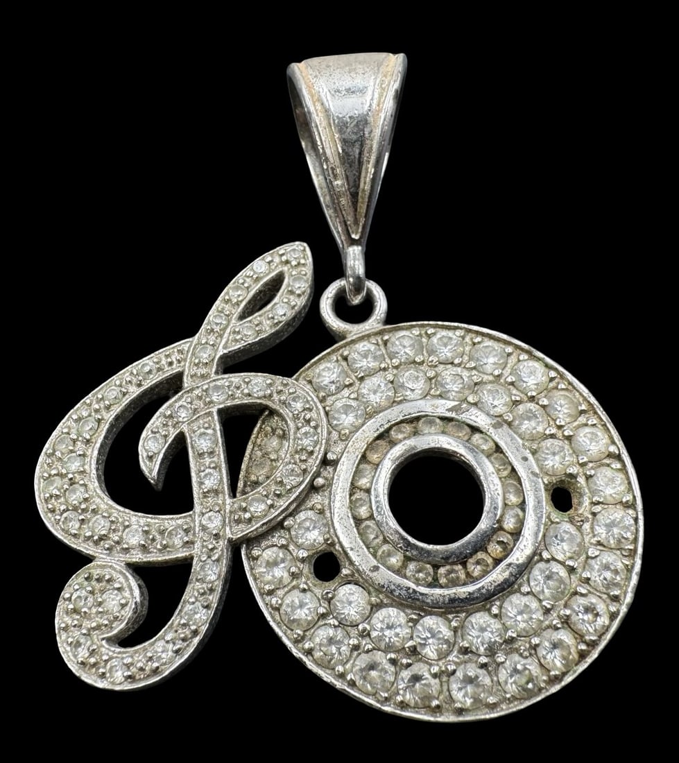Special Vintage 925 Sterling Silver & Rhinestone Musical Clef Pendant: Very good vintage condition with minor patina according to age. Pendant measures approx. 2 1/4" long x 2" wide and weighs ca. 18.1 grams. Marked for 925 Sterling Silver. Missing 2 gemstones.