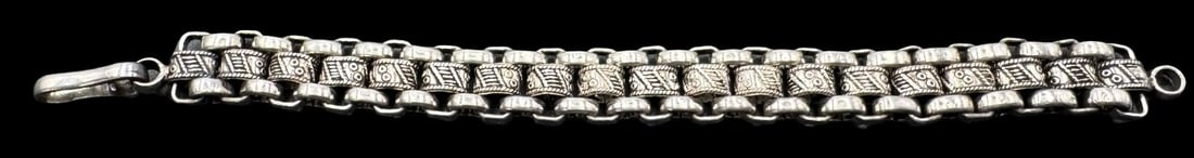 Ornate Vintage 925 Sterling Silver Chain Link Bracelet: Very good vintage condition with minor patina according to age. Measures approx. 8 1/2" long and 5/8" wide and weighs ca. 56.8 grams. Marked for 925 Sterling Silver.