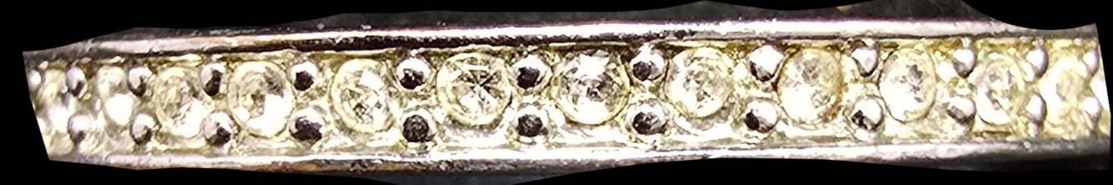 Beautiful Vintage Silver-Tone Metal & Clear Rhinestone Eternity Band Ring: Very good vintage condition with minor patina according to age. The ring is a size 7.5 and weighs ca. 2 grams.