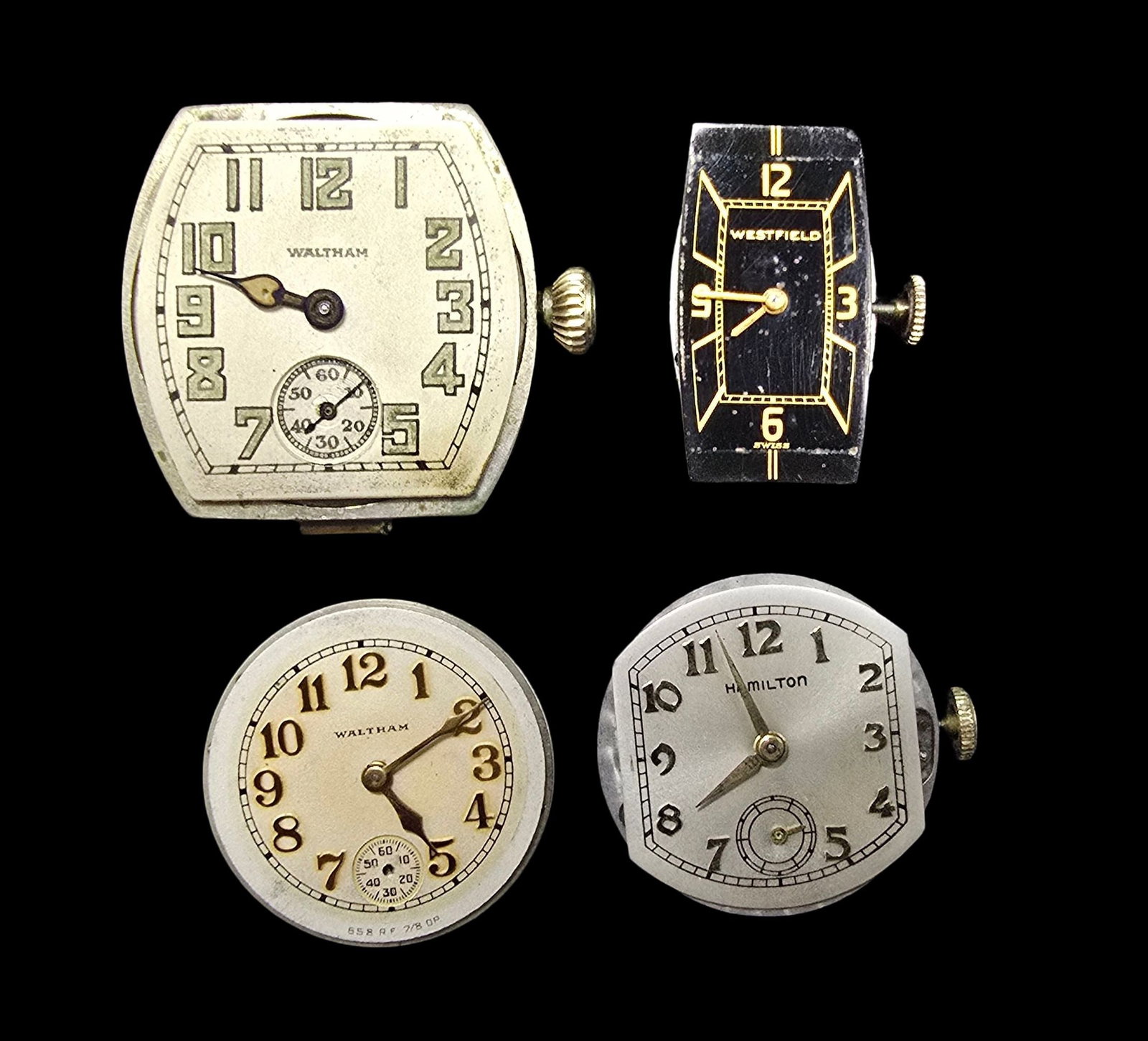 Lot of 4 Watch Movements: Very good vintage condition with minor patina according to age. The largest piece measures approx. 2" high and 1" wide and the entire lot weighs ca. 50 grams.