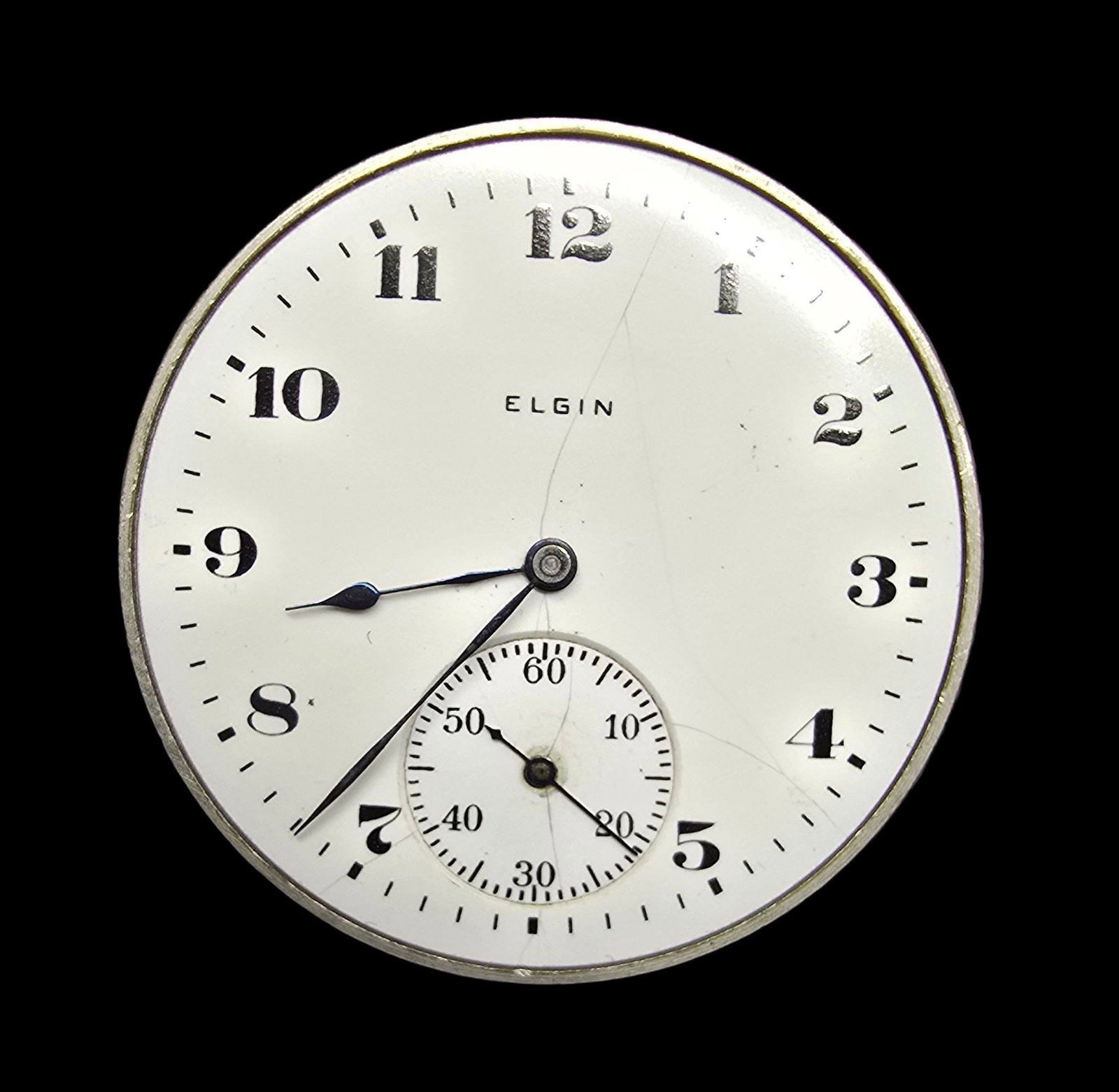 Vintage ELGIN Watch Movement & White Dial: Very good vintage condition with minor patina according to age. Measures approx. 1 1/2" high and 1 1/2" wide and weighs ca. 35 grams. Marked for ELGIN.