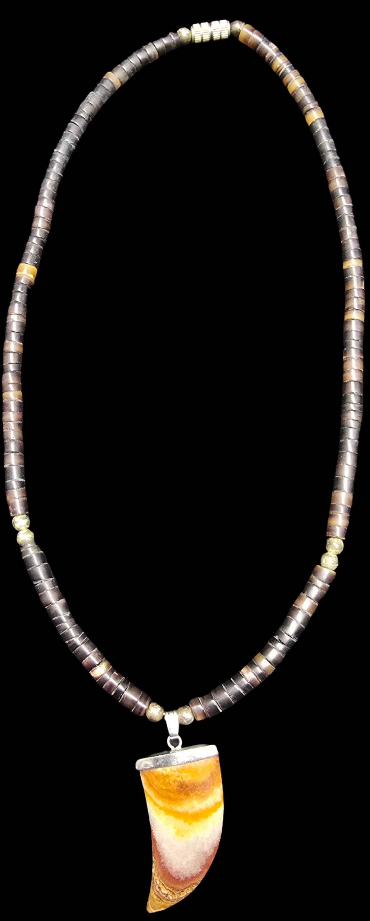 Gorgeous Vintage Hand Carved Gemstone Bead & Tooth Pendant Necklace: Very good vintage condition with minor patina according to age. Measures approx. 19" long and weighs ca. 24 grams.