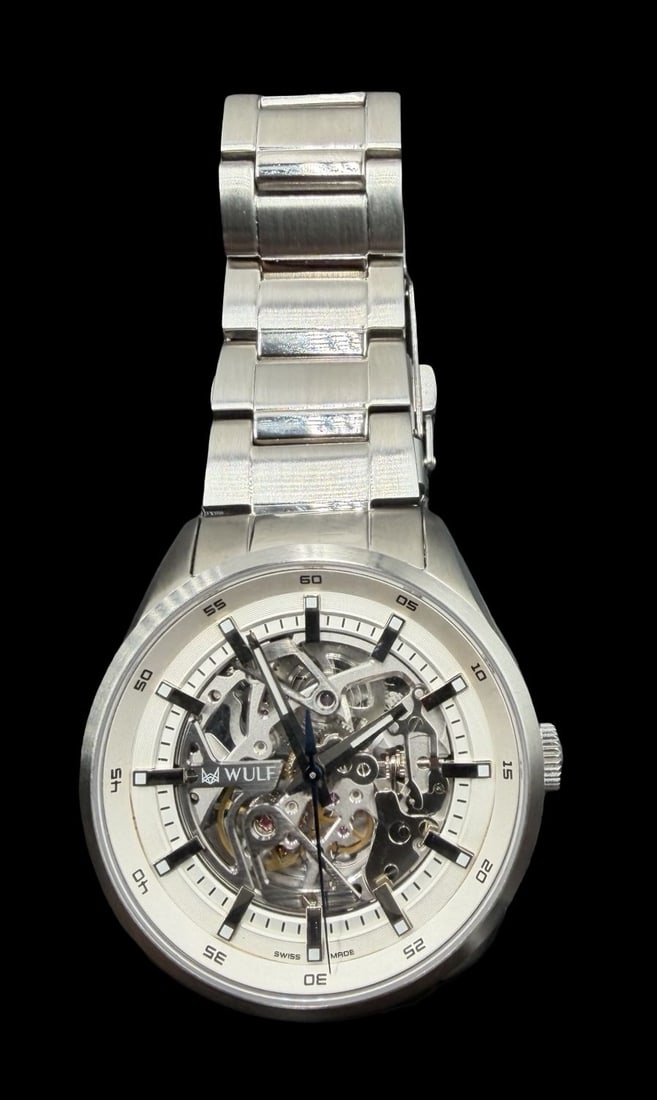 Beautiful Vintage WULF Stainless Steel Sapphire Crystal & White Dial Watch /w Box: Very good vintage condition with minor patina according to age. Dial measures approx. 1 1/2" long and 1 1/2" wide and weighs ca. 148.2 grams. Marked for WULF. The timepiece is functional. Made in Swit