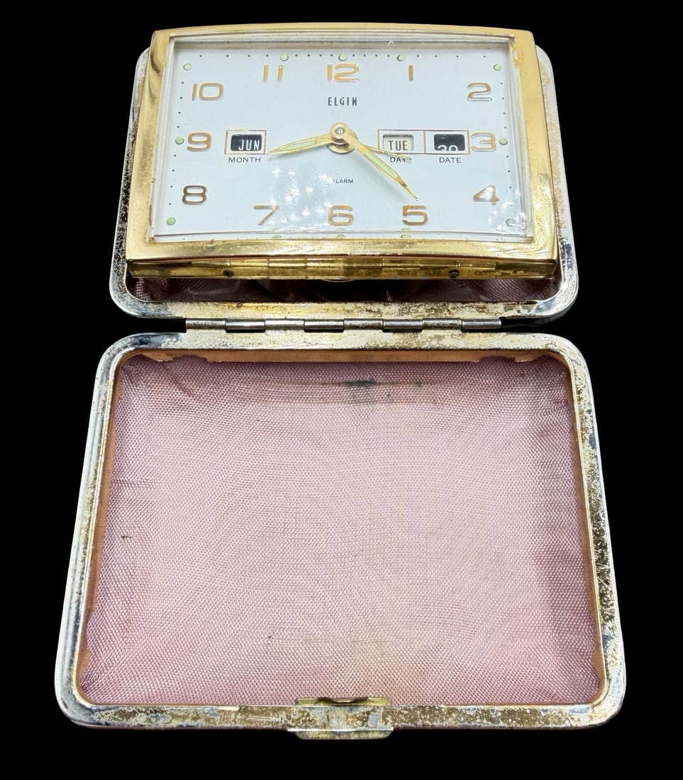 Amazing Vintage ELGIN Stainless Steel & White Dial Table Alarm Watch /w Box: Very good vintage condition with minor patina according to age. Dial measures approx. 2" long and 3" wide and weighs ca. 214.3 grams. Marked for ELGIN. The timepiece is currently not working.