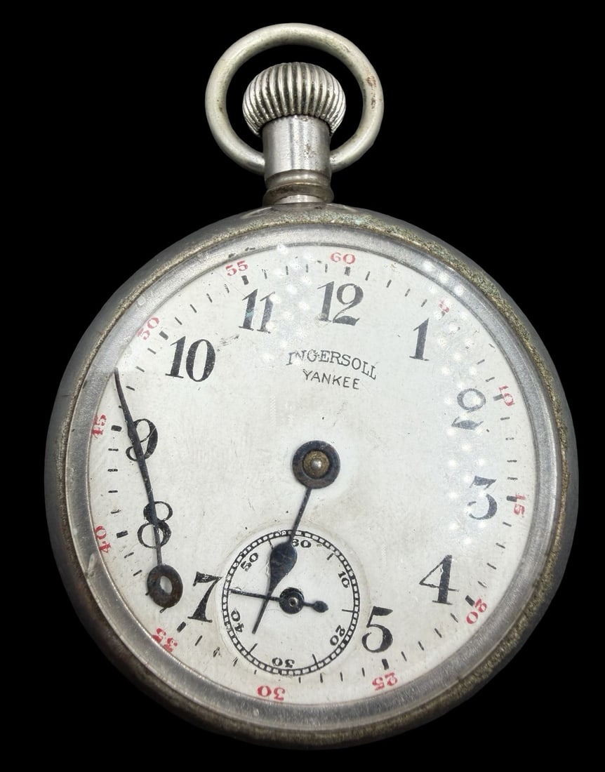 Gorgeous Ornate Vintage INGERSOLL YANKEE Silver-Tone Metal & White Dial Pocket Watch: Very good vintage condition with minor patina according to age. Dial measures approx. 1 1/2" long and 1 1/2" wide and weighs ca. 66.7 grams. Marked for INGERSOLL YANKEE. The timepiece is currently not