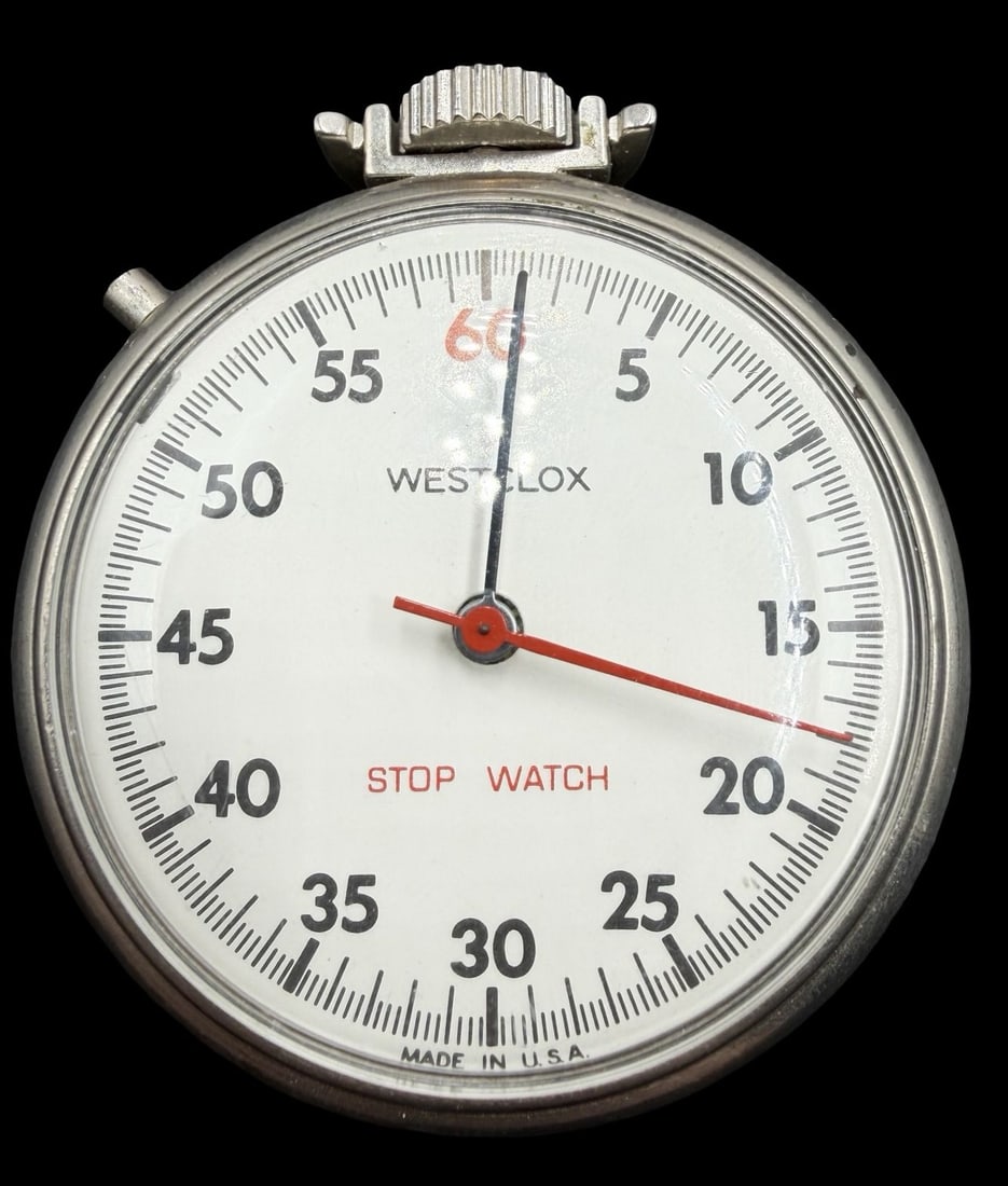 Beautiful Vintage WESTCLOX Silver-Tone Metal & White Dial Pocket Stopwatch: Very good vintage condition with minor patina according to age. Dial measures approx. 1 1/2" long and 1 1/2" wide and weighs ca. 38.2 grams. Marked for WESTCLOX. The timepiece is currently not working