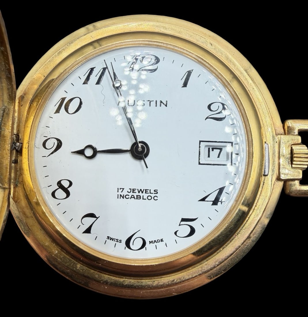 Beautiful Ornate Vintage AUSTIN Gold-Tone Metal 17 Jewels & White Dial Pocket Watch: Very good vintage condition with minor patina according to age. Dial measures approx. 1 1/4" long and 1 1/4" wide and weighs ca. 44.8 grams. Marked for AUSTIN. The timepiece is functional.
