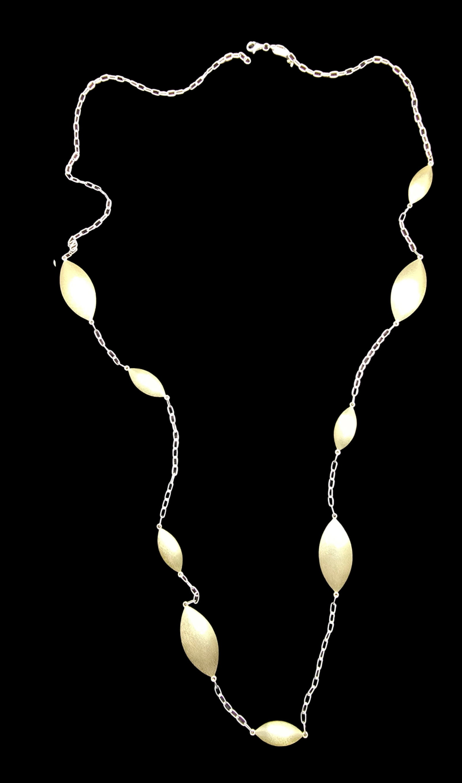 Beautiful Vintage Sterling Silver Necklace /w Brushed Petal Elements: Very good vintage condition with minor patina according to age. Measures approx. 34" long and weighs ca. 24 grams. Marked for Sterling Silver.