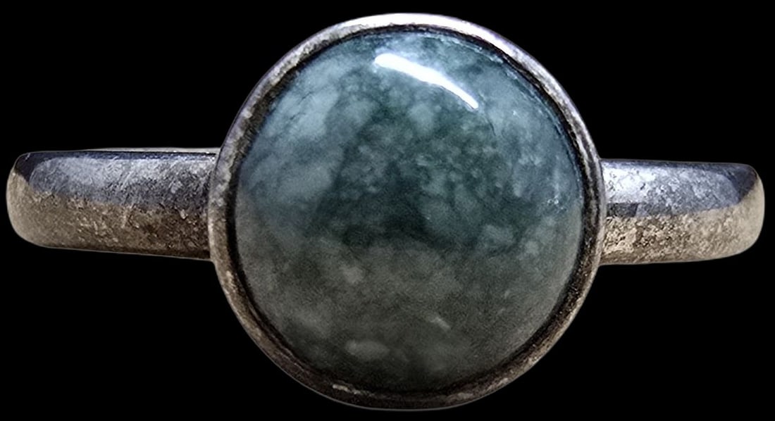 Vintage Mid-Century Sterling Silver Ring /w Green Gemstone: Very good vintage condition with minor patina according to age. The ring is a size 7 and weighs ca. 3 grams. Marked for Sterling Silver.