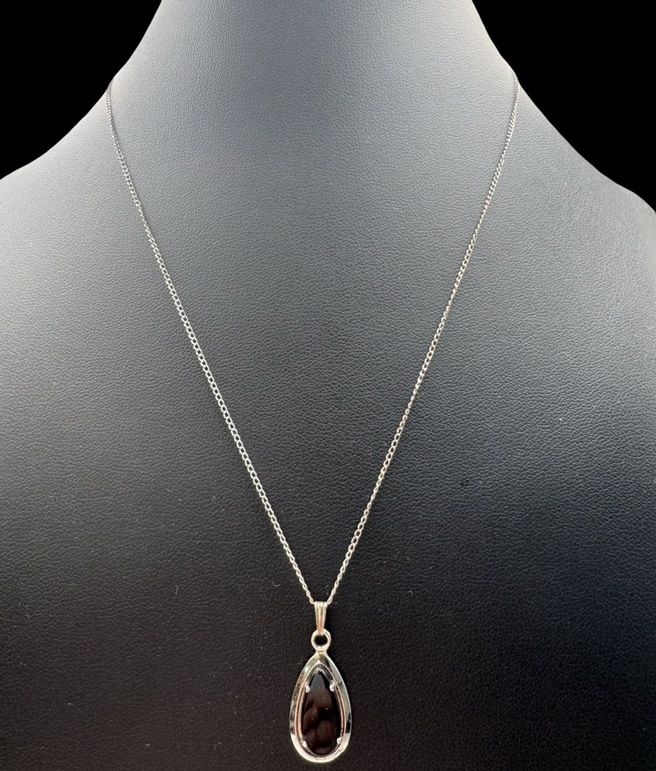Vintage SARAH COVENTRY Sterling Silver Necklace /w Black Onyx Pendant: Very good vintage condition with minor patina according to age. Pendant measures approx. 1" long and 1/2" wide; necklace is approx. 18" and total weight is ca. 2.8 grams. Marked for Sterling Silver & 