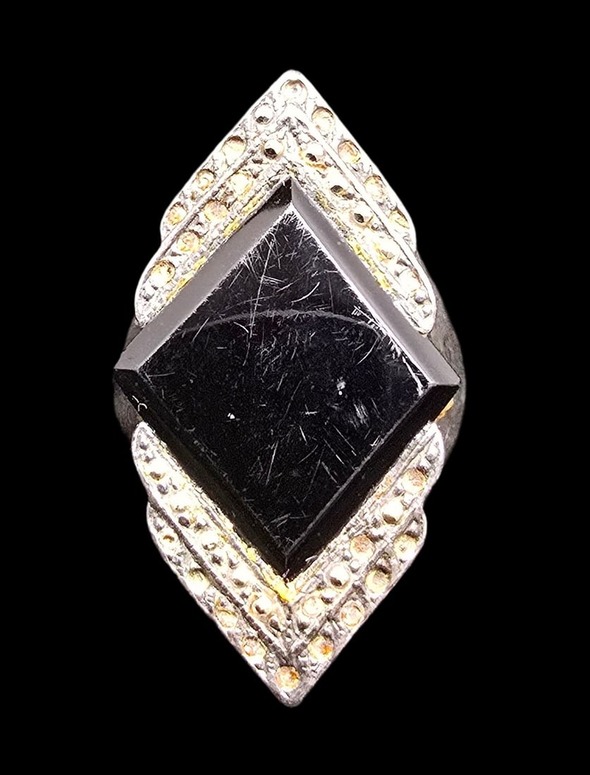 Beautiful Ornate Vintage Sterling Silver /w Big Black Onyx & Clear Rhinestones Ring: Very good vintage condition with minor patina according to age. Measures approx. 1" long and ?" wide and weighs ca. 8 grams. The ring is a size 7. Marked for Sterling Silver.