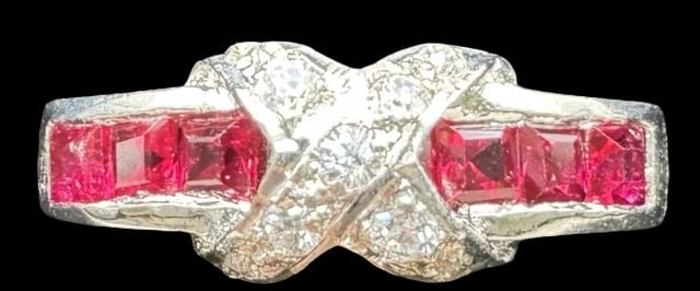 Gorgeous Vintage Sterling Silver & Cubic Zirkonia Rhodinated Designer Ring: Very good vintage condition with minor patina according to age. Measures approx. 3/4" long and 1/4" wide and weighs ca. 3.1 grams. The ring is a size 8. Marked for Sterling Silver.