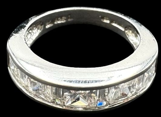 Vintage Sterling Silver & Clear Rhinestone Ring: Very good vintage condition with minor patina according to age. Measures approx. 7/8" long and 3/16" wide and weighs ca. 4.5 grams. The ring is a size 6 3/4. Marked for Sterling Silver.
