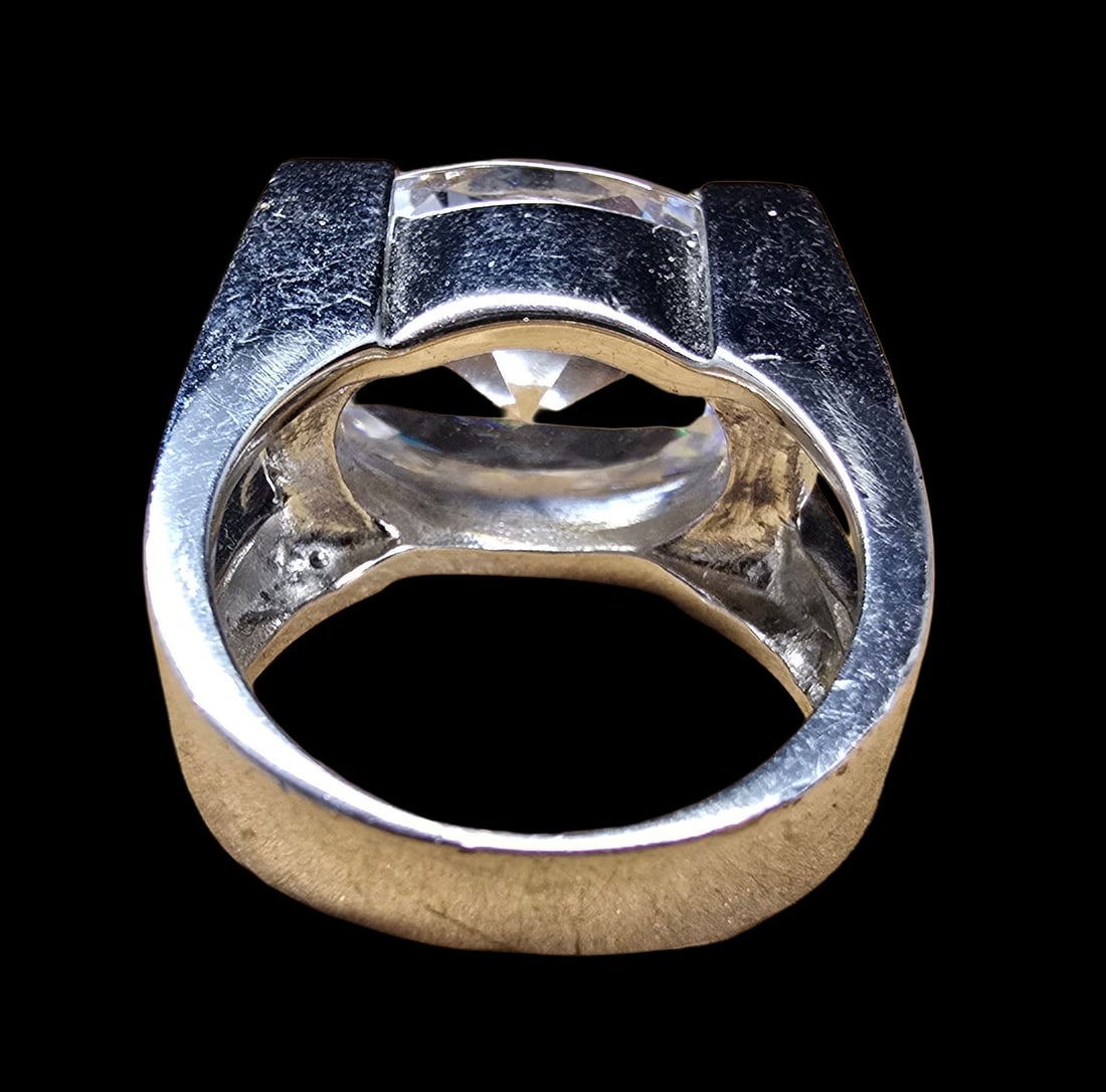 Gorgeous Vintage Sterling Silver & Large Clear Rhinestone Cocktail Ring: Very good vintage condition with minor patina according to age. Measures approx. 1" wide and weighs ca. 14.5 grams. The ring is a size 6. Marked for 925 Sterling Silver