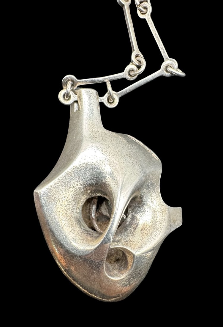 Rare Vintage Mid-Century Modern Swedish LAPPONIA Bj?rn Weckstr?m Man in the Crater Sterling Silver: Very good vintage condition. Measures approx. 22" long, 1/4" wide. Pendant measures approx. 1.5" long, 1.5" wide. Weighs approx. 19.44 grams. Marked for Sterling Silver.