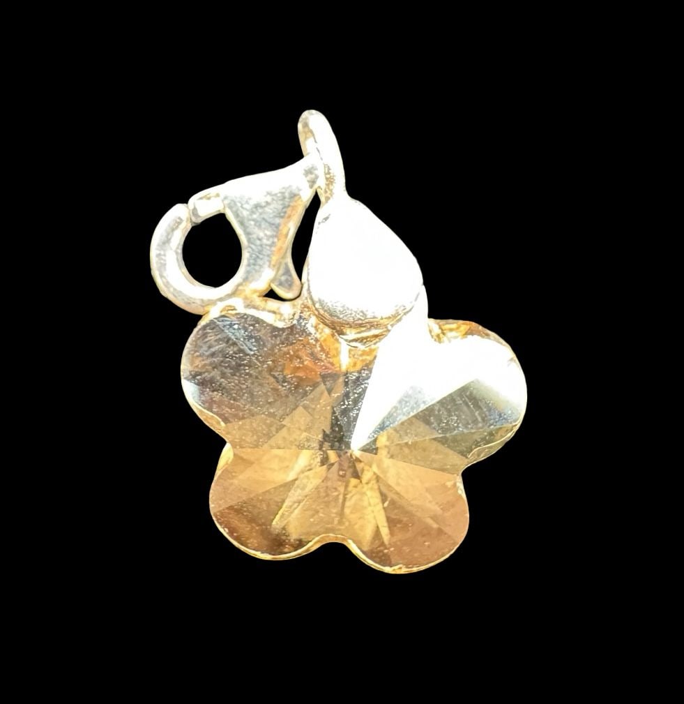 Beautiful Vintage SWAROVSKI Sterling Silver & Crystal Flower Pendant Champagne: Very good vintage condition. Measures approx. 1" long, 1/2" wide. Weighs approx. 2.1 grams. Marked for Sterling Silver.