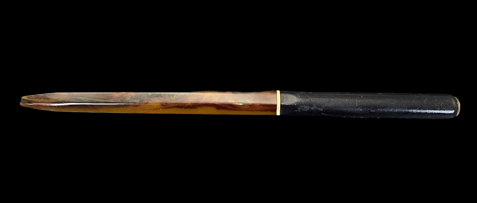 Antique Amber & Black Bakelite Fountain Pen Nib Holder: Very good antique condition with minor wear and patina according to age. Measures approx. 6 1/2" long and weighs ca. 11 grams.