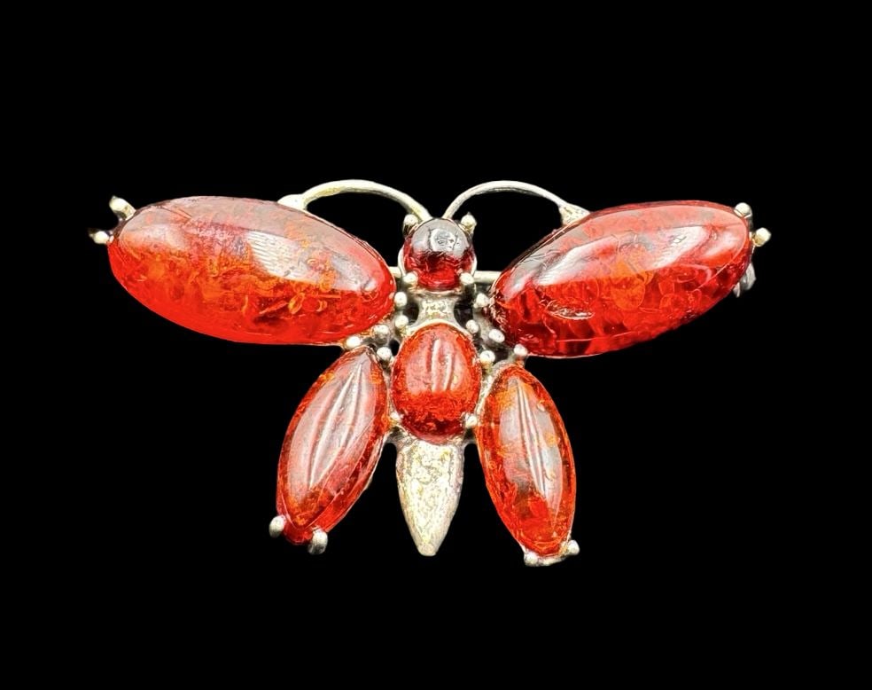 Gorgeous Ornate Vintage Eastern European or Russian Sterling Silver & Baltic Amber Butterfly Brooch: Very good vintage condition with minor patina according to age. Measures approx. 1 1/2" long and 1" wide and weighs ca. 5.2 grams. Tested for Sterling Silver.