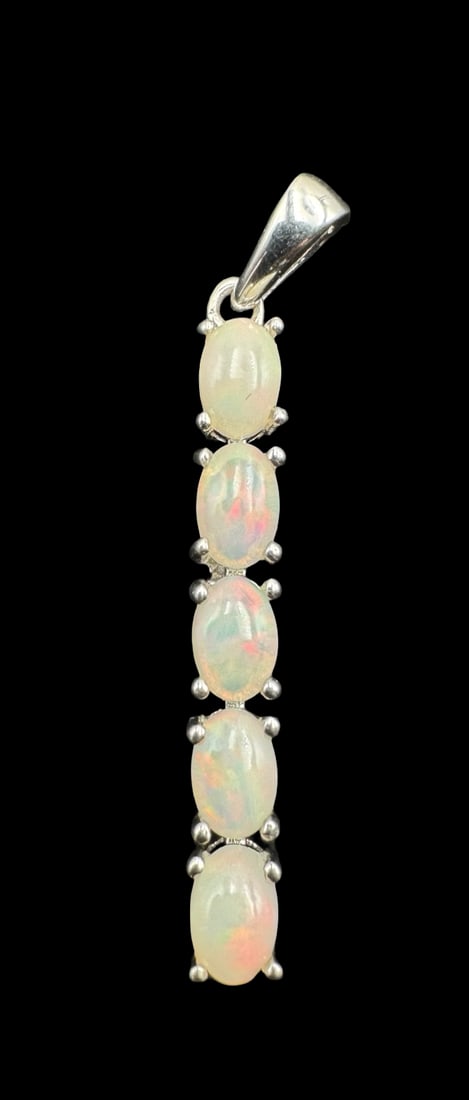 Stunning Vintage Sterling Silver & Gemstone Pendant: Very good vintage condition with minor patina according to age. Measures approx. 1 1/2" long and 1/5" wide and weighs ca. 2.4 grams. Marked for Sterling Silver.